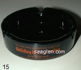 ''The only thing we overlook is the river'', Holiday Hotel / Casino, On the Truckee River, Mill and Center Streets Downtown Reno Glass Ashtray
