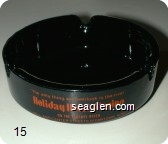 ''The only thing we overlook is the river'', Holiday Hotel / Casino, On the Truckee River, Mill and Center Streets Downtown Reno - Orange imprint Glass Ashtray